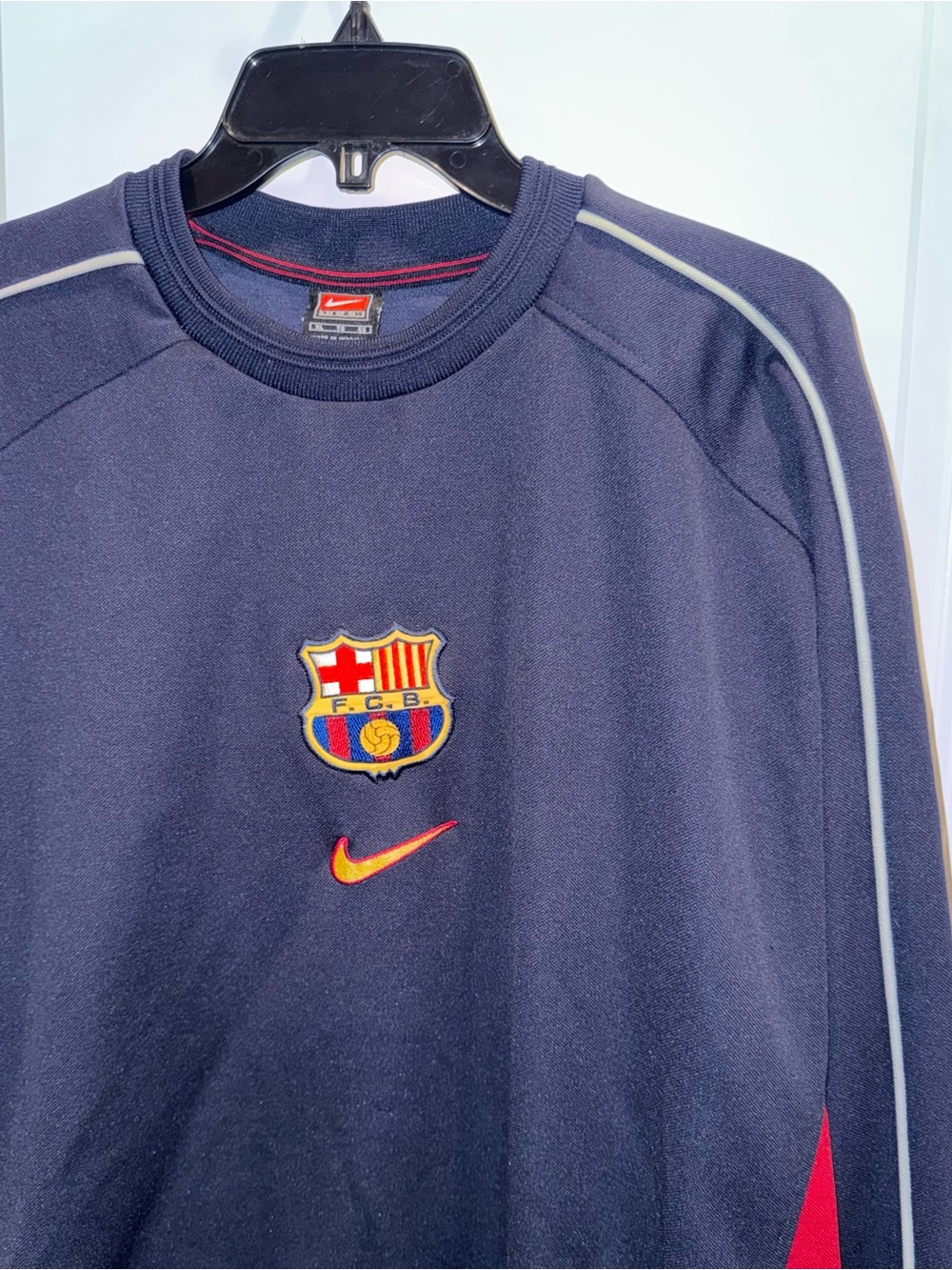 Nike Men’s Navy Crewneck Sweater with FC Barcelona Crest and Red-Orange Swoosh